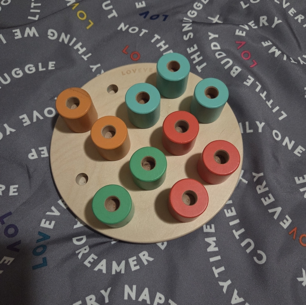 Lovevery wooden stacking peg board